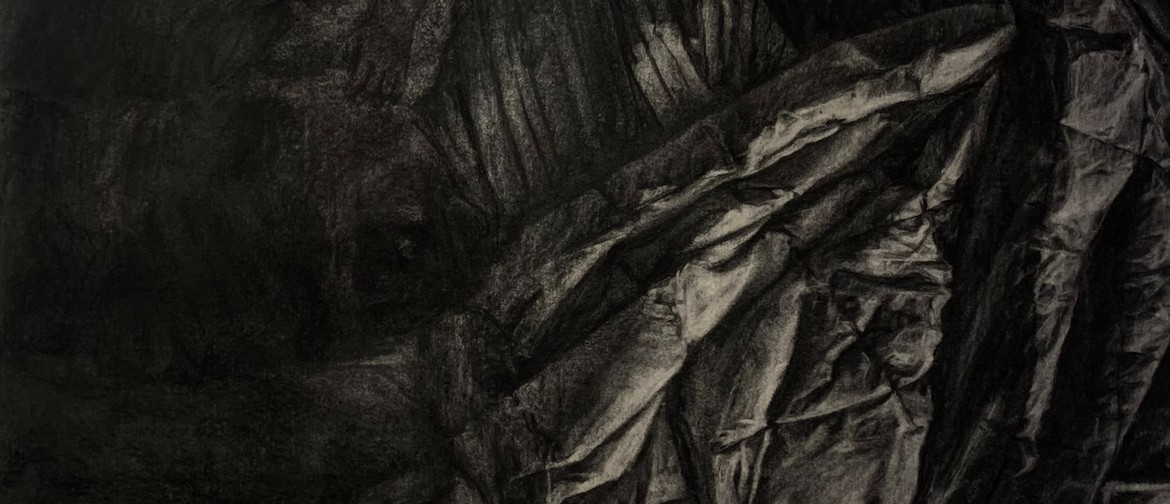 A dark charcoal drawing of a rumpled bed.