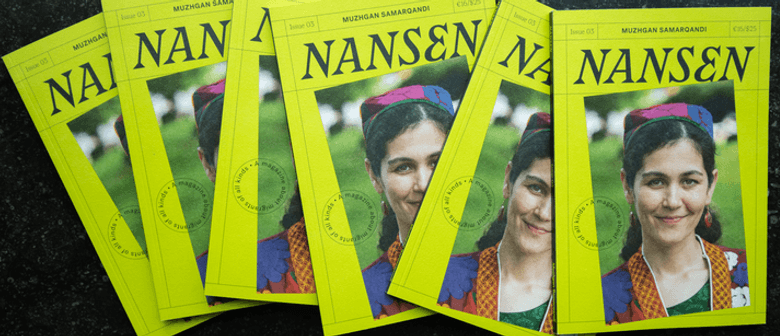 Copies of Nansen magazine displayed on a black tabletop