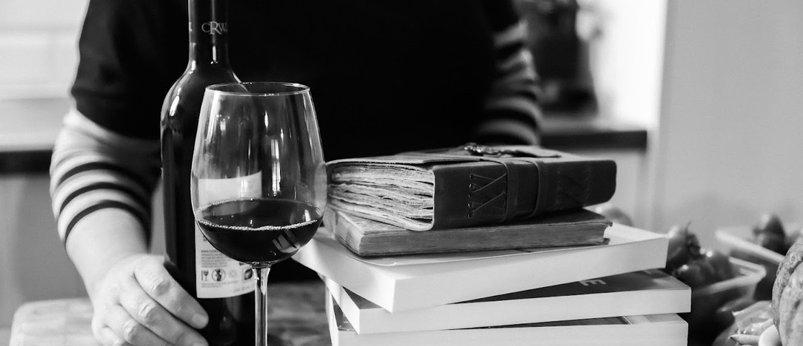 A photo of books and wine - the perfect combination