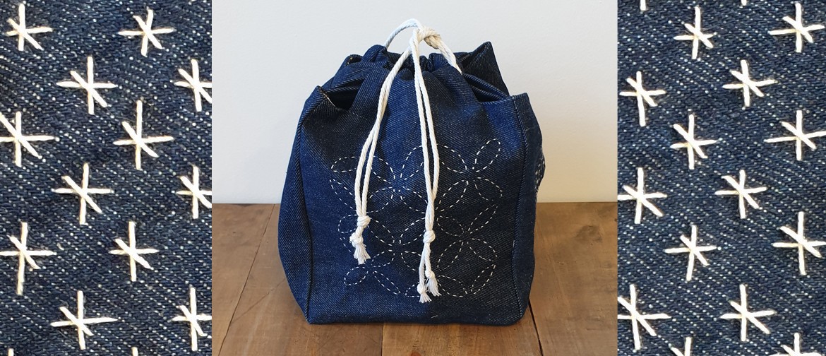 Slow stitched bag made from recycled denim with beautiful layered sashiko stitch decoration