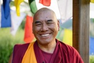 A Buddhist Monk Speaking On Peace and Wellbeing
